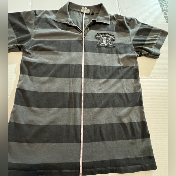 NWOT Men’s distressed Pirates of the Caribbean polo from Disneyland. - Picture 5 of 12